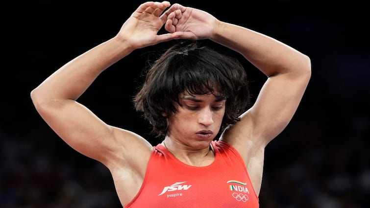 Heartbreak at Paris Olympics Vinesh Phogat Faces Disqualification Found overweight and Medal Dreams Shattered Vinesh Phogat Faces Disqualification: Indian Wrestler Deemed 