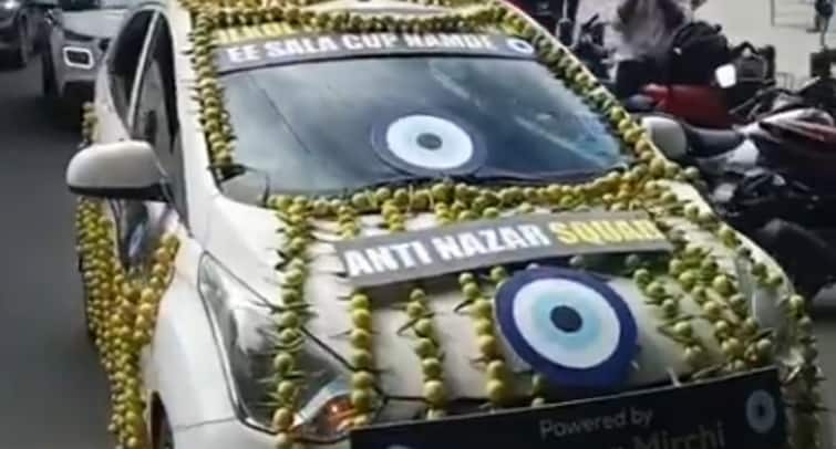 RCB Fan Bizarre Nimbu Mirchi Car Stunt Goes Viral Watch RCB Fan